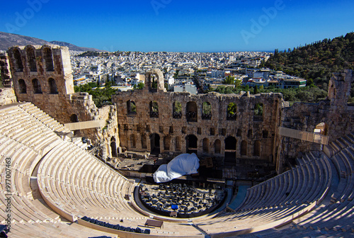The Odeon of Herodes Atticus, he ancient amphitheatre of Herodium, is a stone Roman theatre structure located on the southwest slope of the Acropolis of Athens, Greece photo