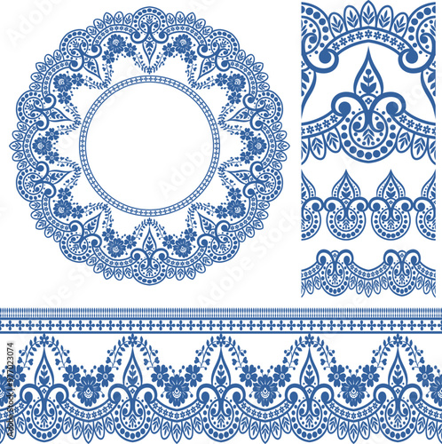 A decorative blue lace design featuring intricate patterns and circular motifs, suitable for crafts and textile applications.