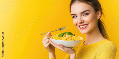 Wallpaper Mural Young woman smile and a eating spaghetti with a fork on color background with copy space, banner template Torontodigital.ca