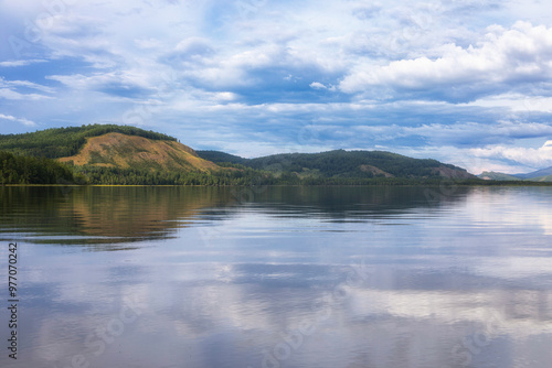 Summer landscape with reflection in water. Russia, Tuva Republic, Lake Azas