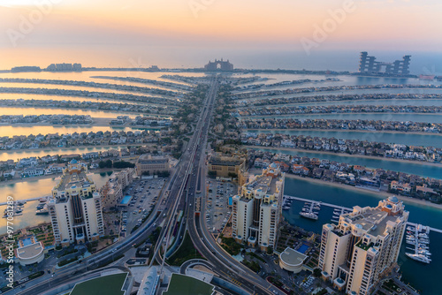 Photography Aerial view of Palm Jumeirah during sunset in Dubai, UAE