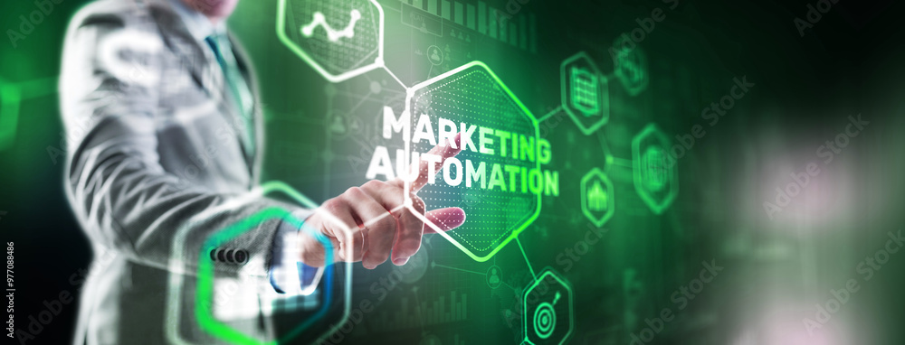 Marketing automation on the virtual screen. Man clicks on the inscription Marketing Marketing automation on the virtual screen. Man clicks on the inscription Marketing