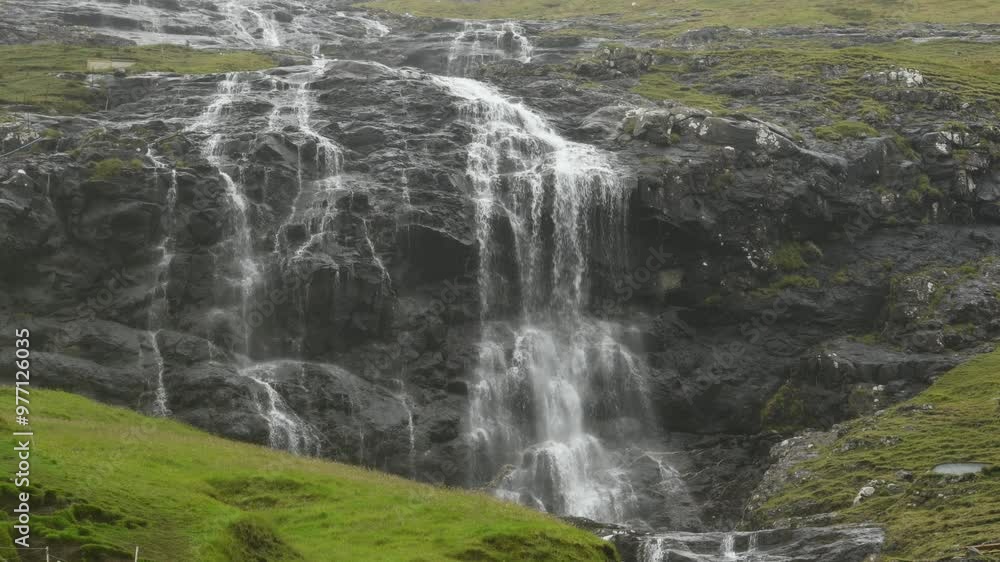 Mountain waterfall. Mountain river. A huge waterfall. Mountain waterfall. Mountain river. A huge waterfall.