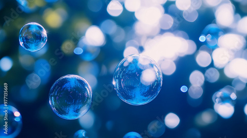 Bubbles floating in sunlight with a blurred blue background during a serene afternoon