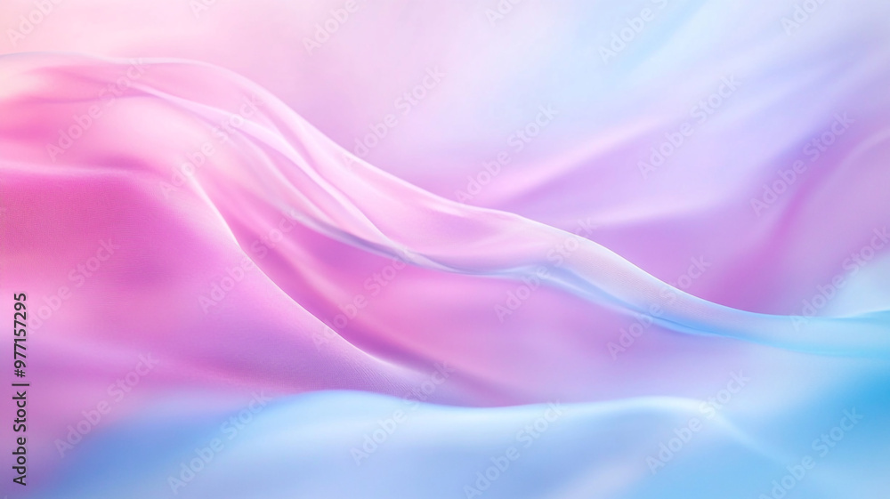 Fototapeta premium Soft pastel fabric in gentle folds creating an ethereal effect in serene colors of blue and pink