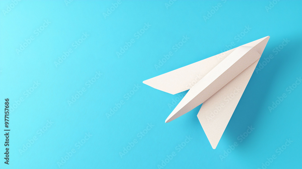 A simple and nostalgic paper plane icon on vibrant blue background evokes feelings of childhood and creativity. This classic design symbolizes freedom and imagination A simple and nostalgic paper plane icon on vibrant blue background evokes feelings of childhood and creativity. This classic design symbolizes freedom and imagination