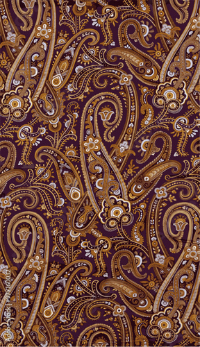 An intricate paisley pattern in rich purple and gold, creating an elegant and timeless textile design.