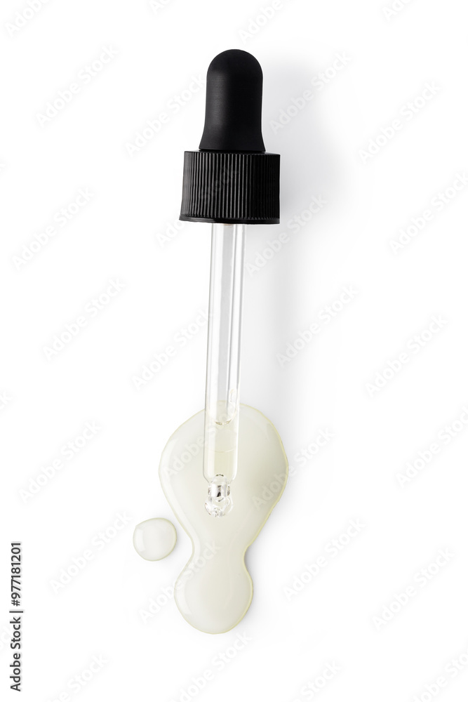 Drop falls from a pipette into a cosmetic bottle Drop falls from a pipette into a cosmetic bottle