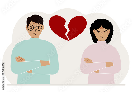 Sad man and woman next to a broken red heart. Broken heart