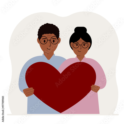 Happy man and woman holding a big red heart in their hands. Love