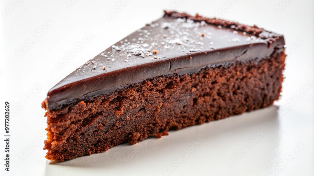 A heavenly, chunky slice of Kladdkaka, gently placed on a bright white background, accentuating the cake's dark, mysterious chocolate tones. A heavenly, chunky slice of Kladdkaka, gently placed on a bright white background, accentuating the cake's dark, mysterious chocolate tones.