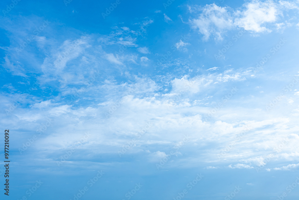 Beautiful blue sky with fluffy white clouds, a perfect summer day Beautiful blue sky with fluffy white clouds, a perfect summer day