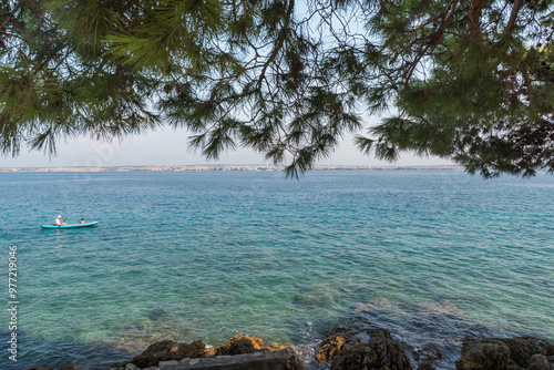  view of Galovac island near Ugljan island with  turquoise sea, Dalmatia region of Croatia photo