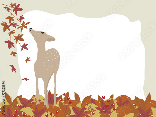 秋の紅葉した落ち葉と鹿