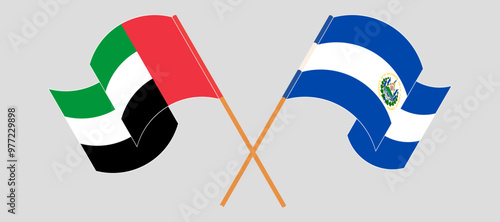 Crossed and waving flags of the United Arab Emirates and Republic of El Salvador. Vector illustration