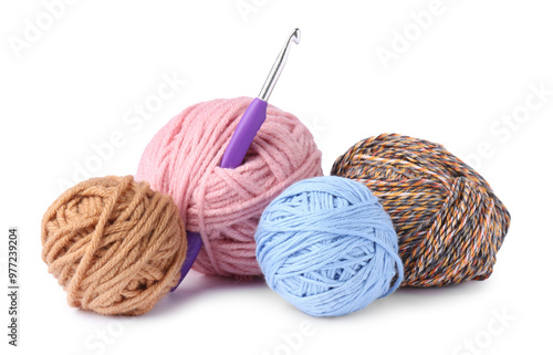 Colorful balls of yarn and crochet hook isolated on white