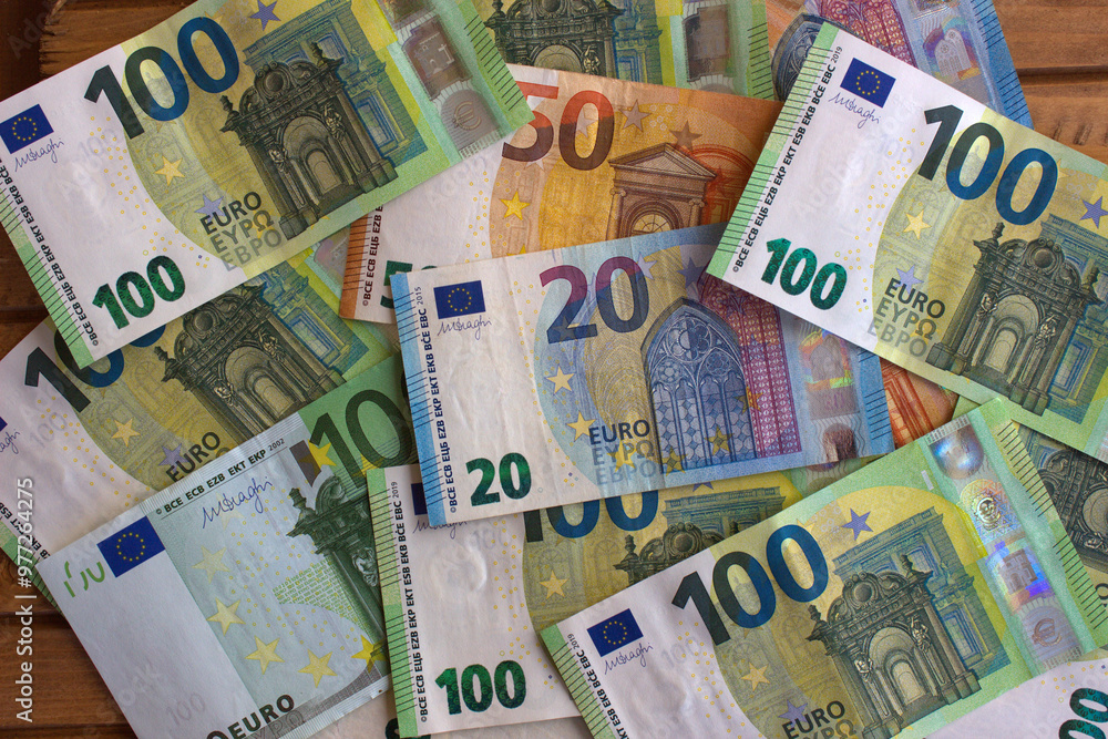 Euro money and coins close-up. The national currency of the European Union Euro money and coins close-up. The national currency of the European Union