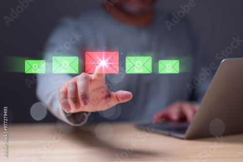 Person interacts with virtual email icons, highlighting secure and insecure messages image emphasizes importance of cybersecurity in digital communications for protecting sensitive information photo