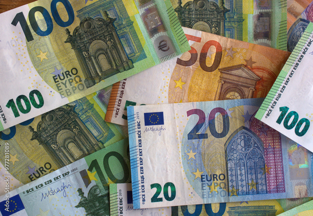 Euro money and coins close-up. The national currency of the European Union Euro money and coins close-up. The national currency of the European Union