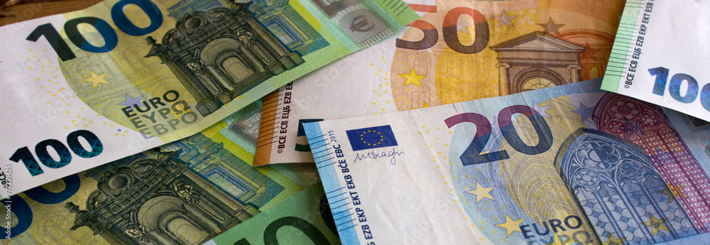 Euro money and coins close-up. The national currency of the European Union Euro money and coins close-up. The national currency of the European Union