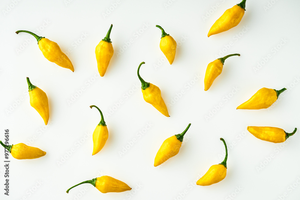 Aji Limo Pepper (Lemon Drop Pepper): Fresh and Spicy Yellow Chili Peppers on White Background Aji Limo Pepper (Lemon Drop Pepper): Fresh and Spicy Yellow Chili Peppers on White Background