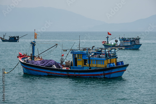 Traditional Fishing Boat. Boats near Nha Trang Vietnam. Fishing industry. photo