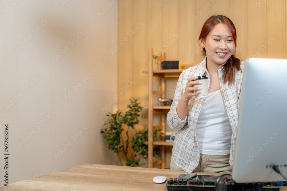 A woman working with video editor at home A woman working with video editor at home