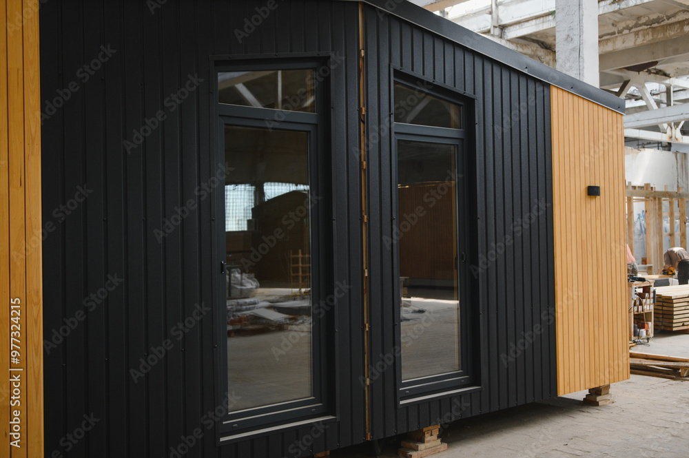 Fototapeta premium A new wooden modular prefabricated house inside in manufacturing facility