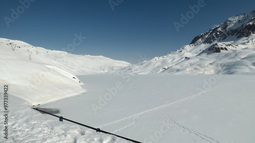 lake toggia in formazza valley during winter photo