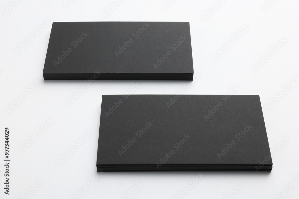 Blank business cards on light grey background. Mockup for design Blank business cards on light grey background. Mockup for design