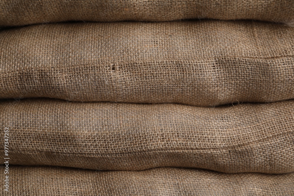 Group of burlap sacks as background, closeup Group of burlap sacks as background, closeup