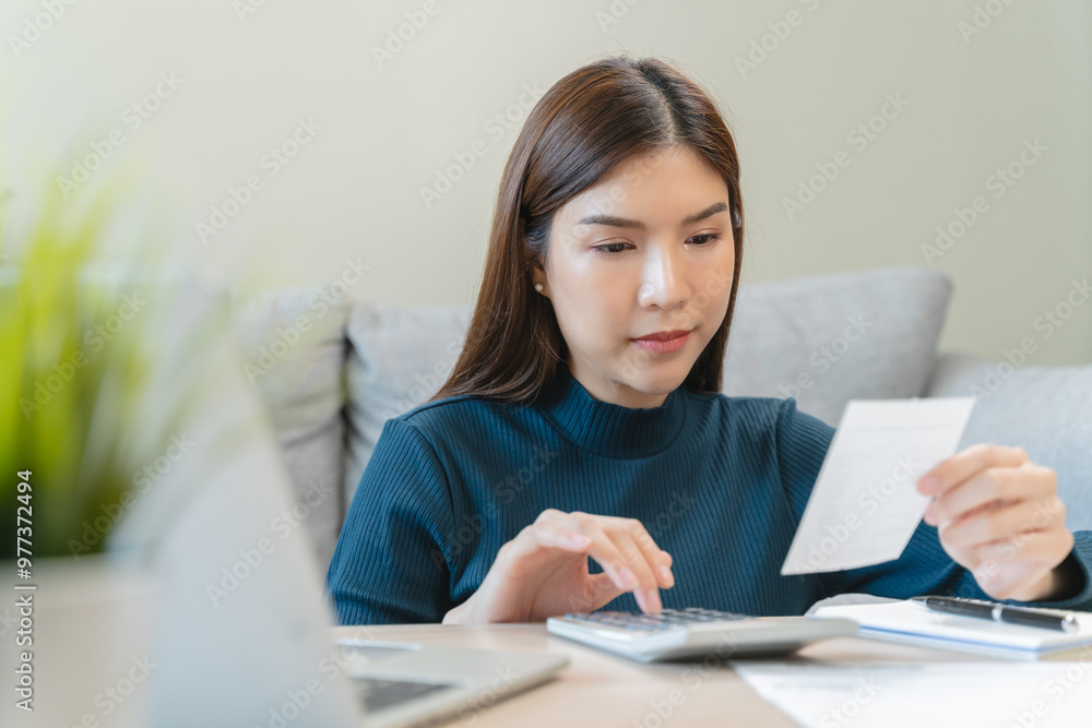 Internet banking, Online shopping at home, asian young woman hand in typing on keyboard, holding credit card, using laptop computer, spending money with purchase on store at home. Shopaholic ecommerce Internet banking, Online shopping at home, asian young woman hand in typing on keyboard, holding credit card, using laptop computer, spending money with purchase on store at home. Shopaholic ecommerce