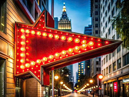 A bright red pointed arrow attached to a modern retro-style marquee sign on a city street at night, shining with vibrant neon lights above. photo