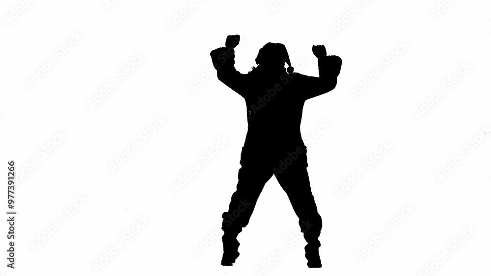 Obraz premium Concept of Christmas and New Year holidays. Black silhouette of man in Santa suit on white isolated background. Santa Claus is dancing funny.