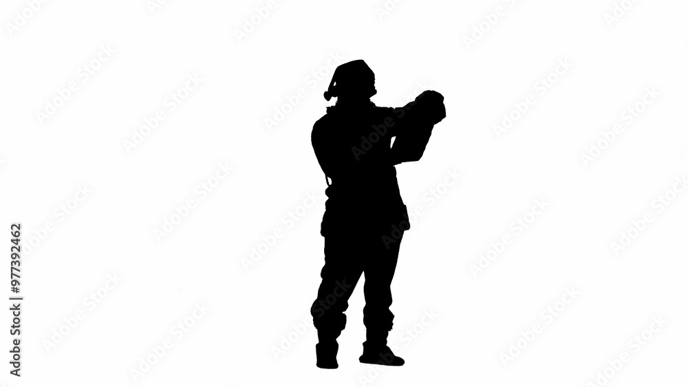 Christmas and New Year holidays concept. Black silhouette of man in Santa Claus costume on white isolated background. Santa Claus opens a paper roll and reads it. Christmas and New Year holidays concept. Black silhouette of man in Santa Claus costume on white isolated background. Santa Claus opens a paper roll and reads it.