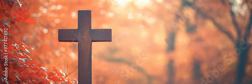 Cross Under Autumn Tree at Sunrise, Symbol of Steadfast Faith, Spiritual Seasons, Trust in God, Resilience Through Change photo