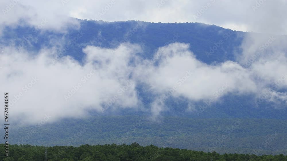 Mist flowing through the mountain valley at Chiang Kam Mountain, Chiangmai, Thailand Mist flowing through the mountain valley at Chiang Kam Mountain, Chiangmai, Thailand