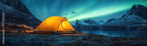 Glowing Yellow Tent Under Aurora and Starry Night Sky