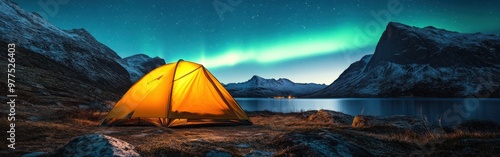 Glowing Yellow Tent Under Aurora and Starry Night Sky