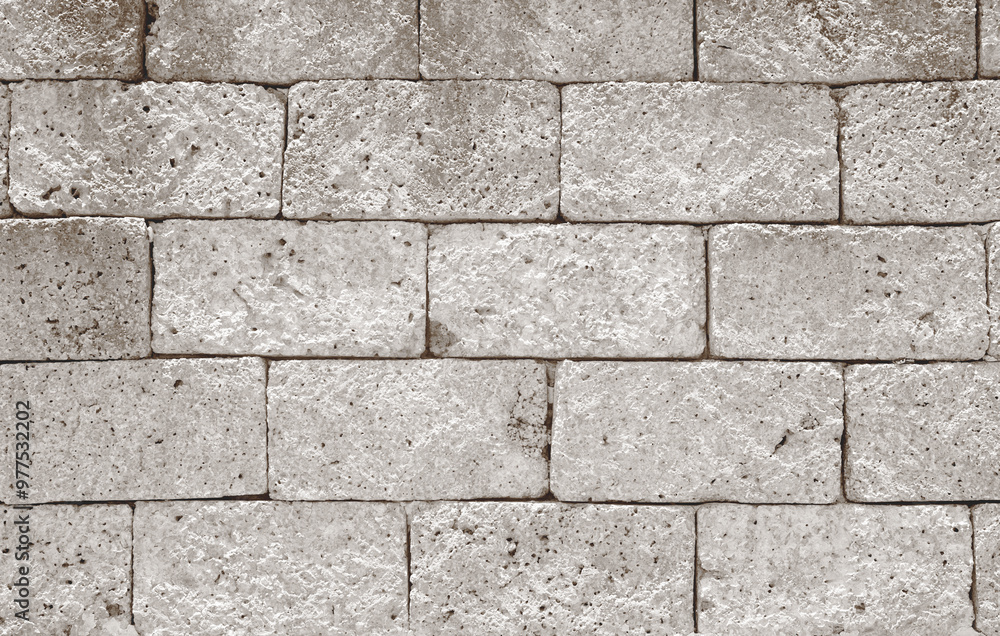 Ancient grey laterite brick wall for abstract seamless background and texture. beautiful patterns, space for work, close up. Ancient grey laterite brick wall for abstract seamless background and texture. beautiful patterns, space for work, close up.