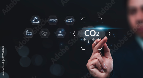 Reducing CO2 emissions and combat global warming and climate change. Businessman planning new ideas and technology for eco-friendly solutions for a sustainable future.