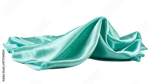 turquoise silk fabric is elegantly draped, showcasing smooth, flowing folds and a luxurious texture