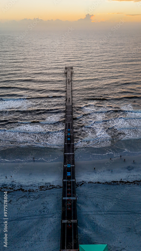 Aerial view of sunrise at Jacksonville Beach pier in Jacksonville Beach Florida USA Aerial view of sunrise at Jacksonville Beach pier in Jacksonville Beach Florida USA
