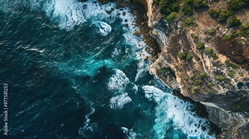 Aerial View of Ocean Waves Crashing Against Rugged Coastline