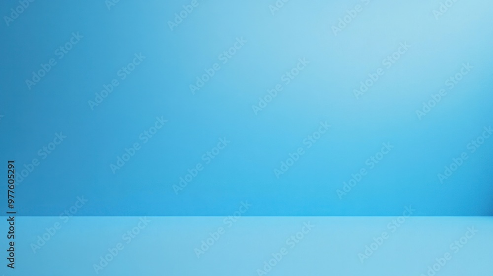 Fototapeta premium A plain blue background with a simple and clean surface, ideal for minimalist or professional designs.