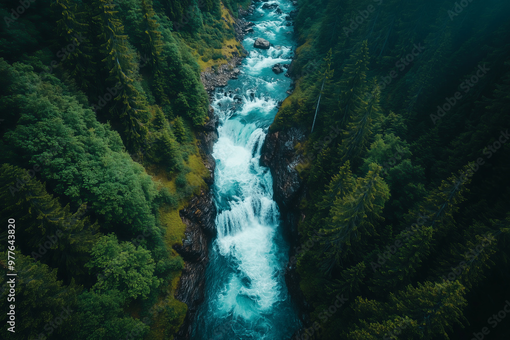 Aerial view of a beautiful waterfall, water flowing from a height into a stream. Aerial view of a beautiful waterfall, water flowing from a height into a stream.