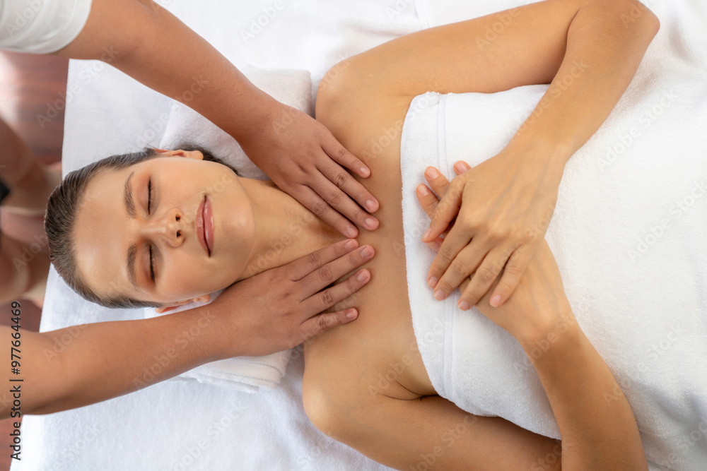 Panorama top view woman customer enjoying relaxing anti-stress spa massage and pampering with beauty skin recreation leisure in day light ambient salon spa at luxury resort or hotel. Quiescent Panorama top view woman customer enjoying relaxing anti-stress spa massage and pampering with beauty skin recreation leisure in day light ambient salon spa at luxury resort or hotel. Quiescent