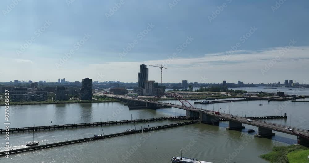 Schellingwouderbrug and the newly constructed Amsterdam Sluisbuurt on Zeeburgereiland, Amsterdam. Schellingwouderbrug and the newly constructed Amsterdam Sluisbuurt on Zeeburgereiland, Amsterdam.
