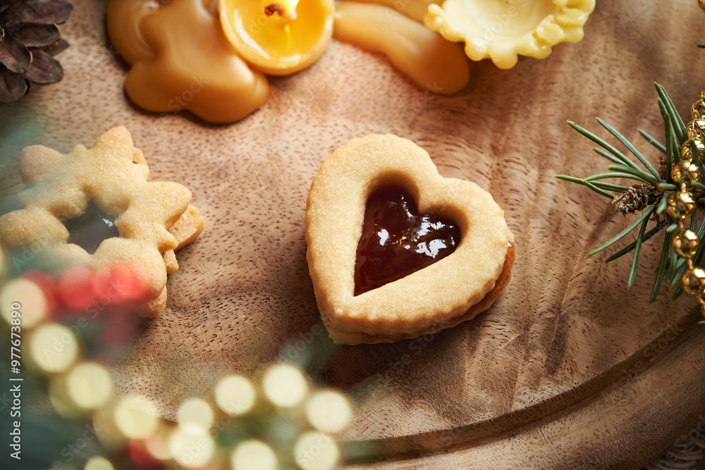Linzer Christmas cookies filled with strawberry jam with Christmas decoration Linzer Christmas cookies filled with strawberry jam with Christmas decoration