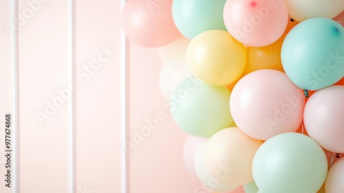 Wallpaper Mural A bunch of colorful balloons are floating in the air. The balloons are in various colors, including pink, yellow, and green. Concept of joy and celebration Torontodigital.ca